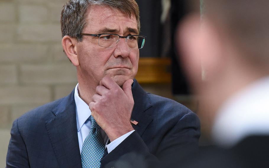 Defense Secretary Ash Carter speaks with West Point faculty during his trip to the U.S. Military Academy on March 23, 2016.