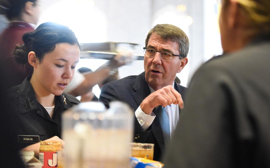 Defense Secretary Ash Carter eats lunch with West Point cadets who will graduate in May during his trip to the U.S. Military Academy on March 23, 2016.