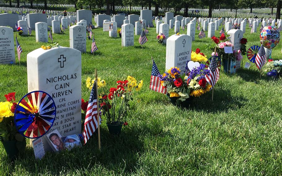 Graves in Section 60 are decorated on Memorial Day weekend 2016 at Arlington National Cemetery.