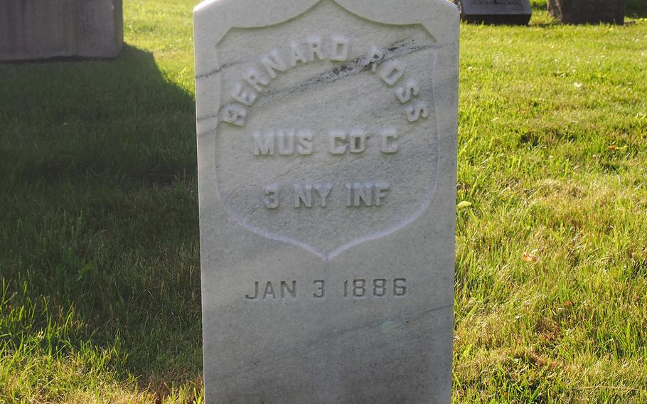 The new tombstone of Bernard Ross, a drummer boy in World War I, buried at St. Agnes Cemetery in Menands, N.Y. The cemetery replaced the stone in a project to commemorate its veterans.