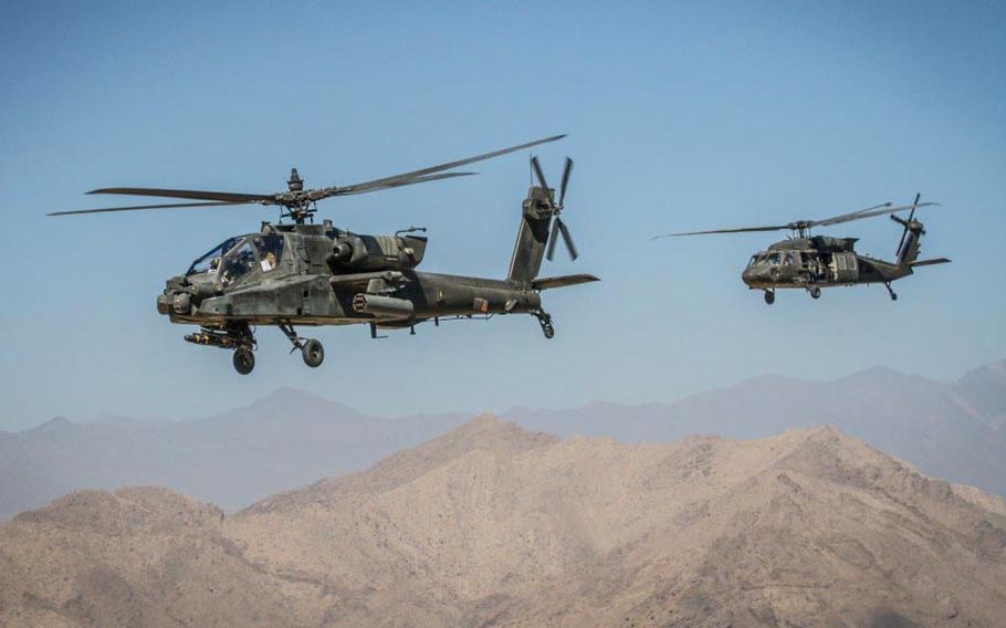 An AH-64 Apache helicopter patrols the skies over eastern Afghanistan on Sept. 16, 2014.