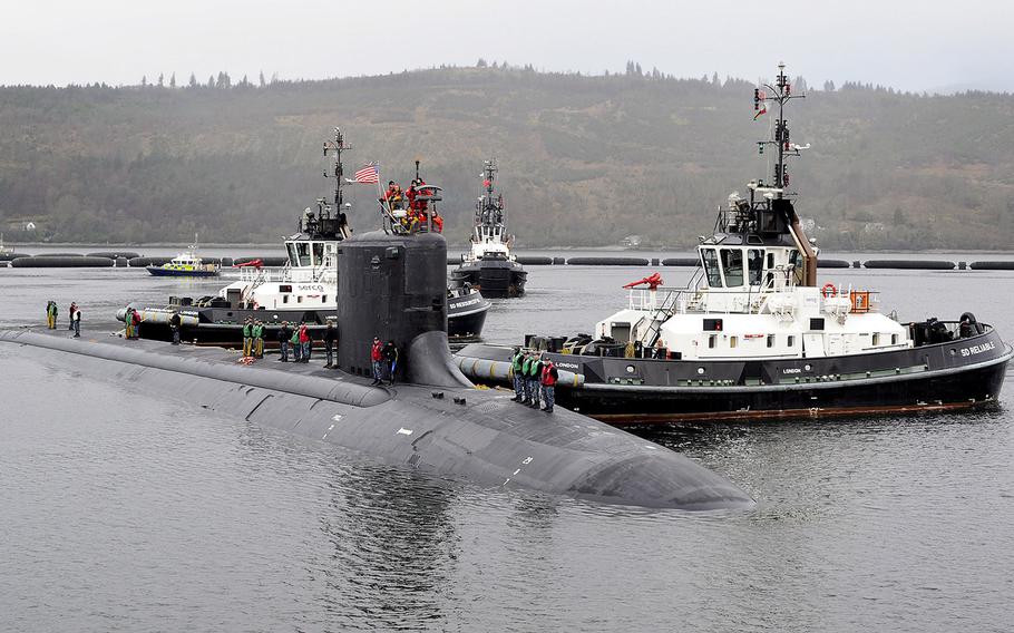 The Virginia-class attack submarine USS Virginia arrives at Her Majesty's Naval Base, Clyde in Faslane, U.K., for a scheduled port visit March 22, 2016.