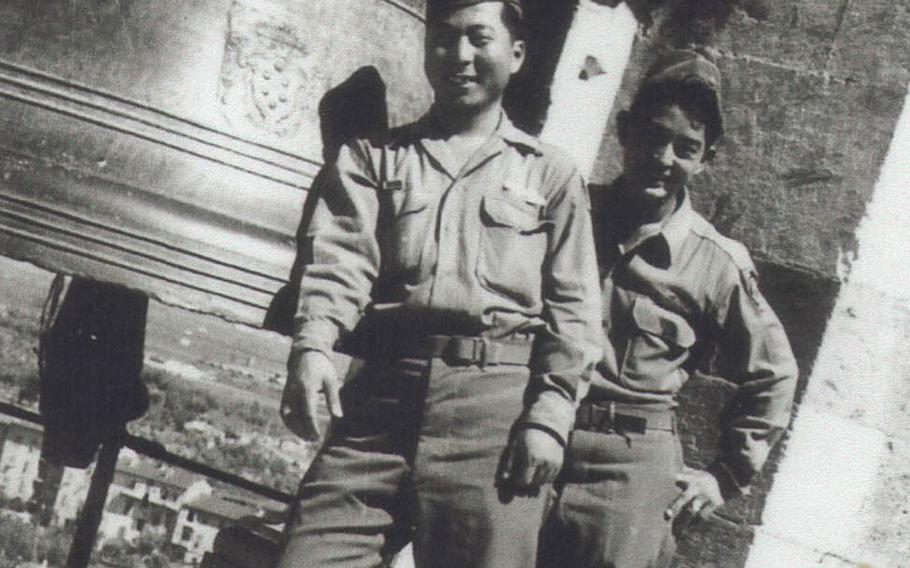 Noboru Kawamoto stands in 1945 next to a bell in the city of Pisa, Italy, where he served with the 442nd Regimental Combat Team during World War II.
