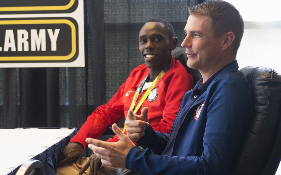 Paralympians Glenn Eller (right) chats during a media round table as Paul Chelimo looks on during the 2016 AUSA annual meeting in Washington, D.C., October 4, 2016