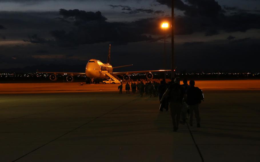 Soldiers board a flight to U.S. Central Command for a deployment in support of Operation Spartan Shield June 1, 2016.