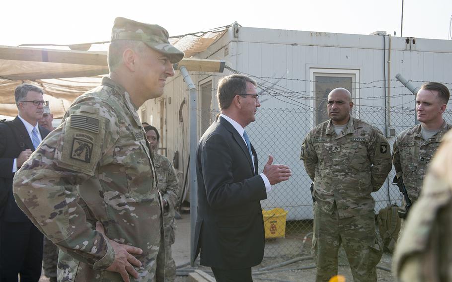 Secretary of Defense Ash Carter and U.S. Army Lt. Gen. Stephen Townsend, commander of Combined Joint Task Force-Operation Inherent Resolve, talk with members of the 101st Airborne Division in Irbil, Iraq, Oct. 23, 2016. 