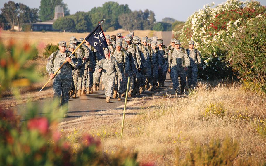 Led by the 184th Infantry Company guidon, more than 40 California National Guard soldiers march on Aug. 24, 2007, in Rancho Cordova, Calif., to honor the nine soldiers killed while the company was deployed to Iraq in 2005-2006.
