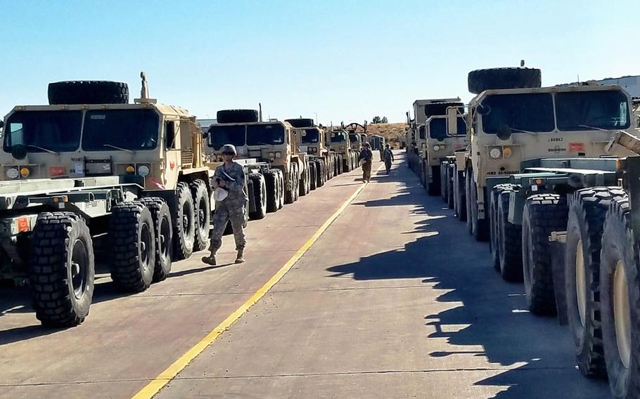 Soldiers from Fort Carson, Colo., stage tactical vehicles for loading on to trains on Nov. 7, 2016, as the vehicles are prepped to be transported to Bremerhaven, Germany.