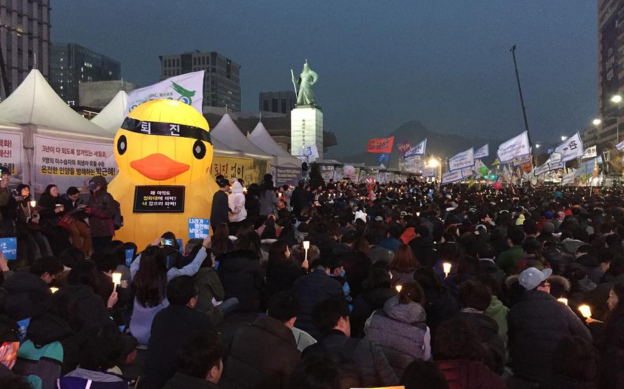 Hundreds of thousands of South Koreans fill the historic Gwanghamun Square and surrounding streets in Seoul on Saturday, Nov. 19, for the fourth week in a row. They’re calling on President Park Geun-hye to resign over an influence peddling and corruption scandal involving a close friend.