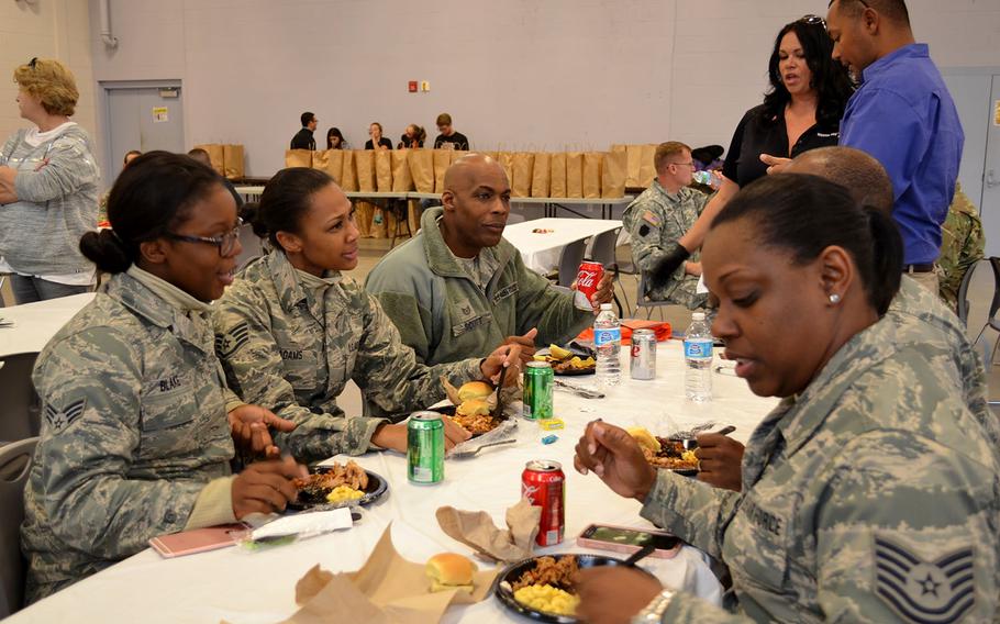 Members of the 111th Attack Wing enjoy a luncheon and donation event hosted by the USO of Pennsylvania and Southern New Jersey (Liberty USO) at Horsham Air Guard Station, Pennsylvania on Nov. 12, 2016. Mission BBQ and the Philadelphia Flyers organization helped the USO with the event and donated more than 50 packages of traditional Thanksgiving Day grocery items to military members.