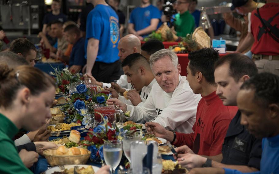 Secretary of the Navy Ray Mabus eats Thanksgiving dinner with sailors aboard the aircraft carrier USS Dwight D. Eisenhower in the Arabian Gulf on Nov. 24, 2016. Ike's culinary specialists prepared more than 4,950 pounds of turkey, 1,050 pounds of ham, 1,200 pounds of beef tenderloin, 648 pounds of shrimp cocktail, 7,000 portions of mashed potatoes, 400 pies and 200 cheesecakes for the Thanksgiving meal.