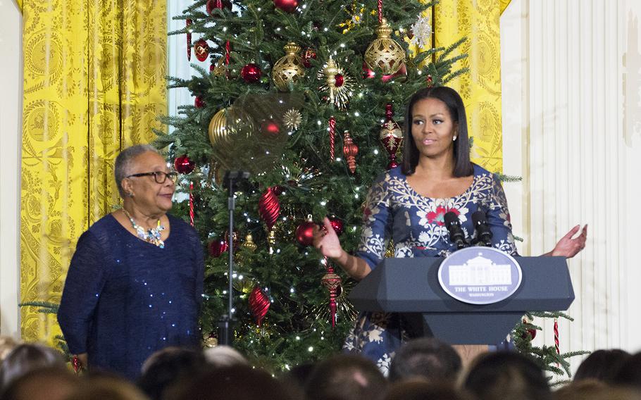 First Lady Michelle Obama welcomes military families to the White House to preview holiday decorations on Nov. 29, 2016. At left is veteran Hazel Bethel of Miami, who migrated from Trinidad in the 1970s and then joined the U.S. Army.