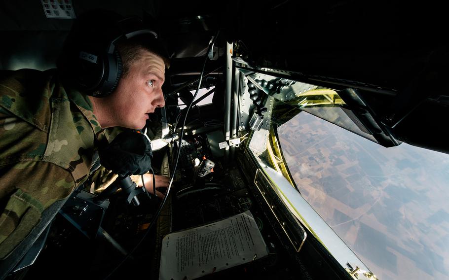 Senior Airman Kix Payne, a boom operator with the 340th Expeditionary Air Refueling Squadron, prepares for a Marine EA-6B Prowler to refuel over Iraq on Tuesday Nov. 29, 2016. Airstrikes by coalition aircraft damaged four bridges over the Tigris River in Mosul,  rendering them useless to militants, Pentagon officials said Wednesday.