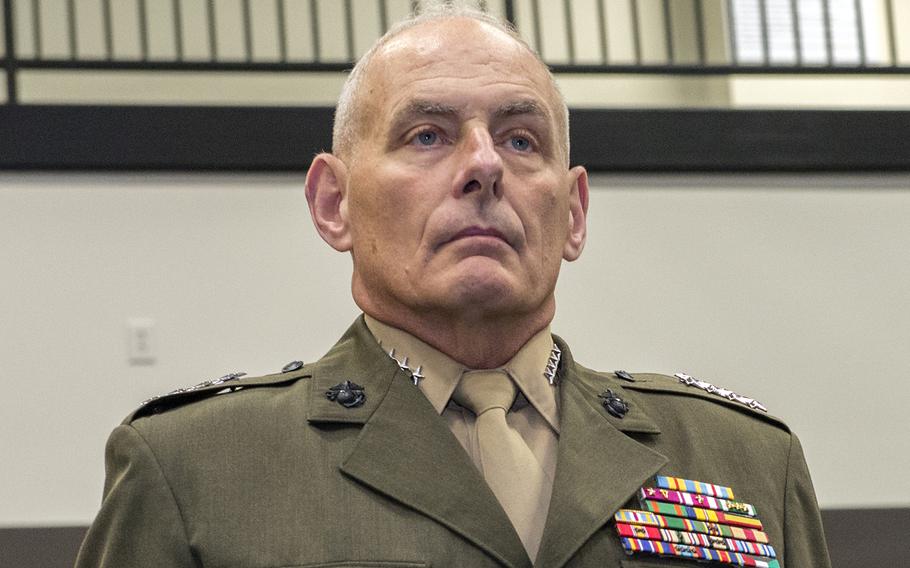 Marine Gen. John Kelly (now retired) stands at attention during a change of command ceremony at the U.S. Southern Command headquarters in Doral, Fla., on Jan. 14, 2016.