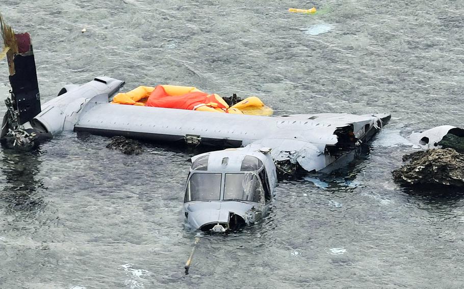 Wreckage of a U.S. military MV-22 Osprey is seen in shallow waters off Nago, Okinawa, on Wednesday, Dec. 14, 2016, The Tuesday night crash has triggered protests on Okinawa, where anti-U.S. military sentiment is already strong.