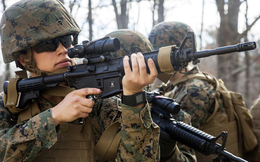 U.S. Marines assigned to the 22nd Marine Expeditionary Unit conduct an urban operations training exercise with the Female Engagement Team (FET) at Fort Pickett, Va., Feb. 21, 2016.