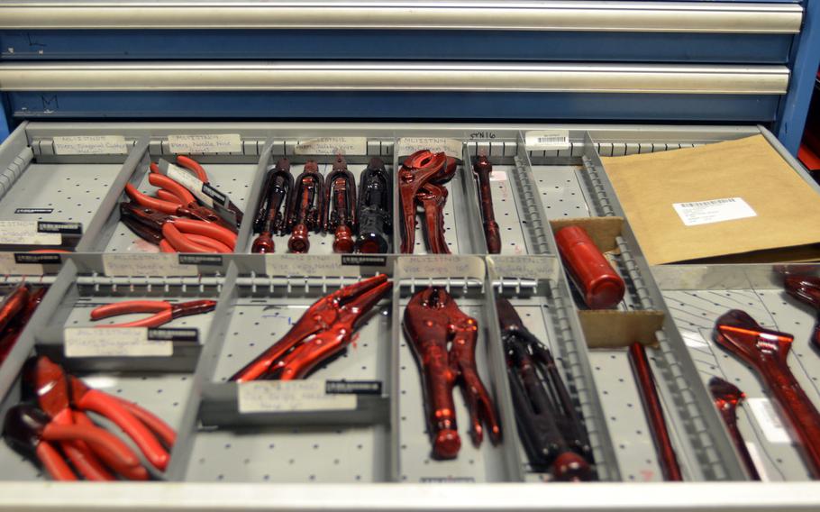 A drawer of spare tools covered in protective plastic coating from the 100th Maintenance Squadron inspection section at RAF Mildenhall, England, Tuesday, Jan. 10, 2017.