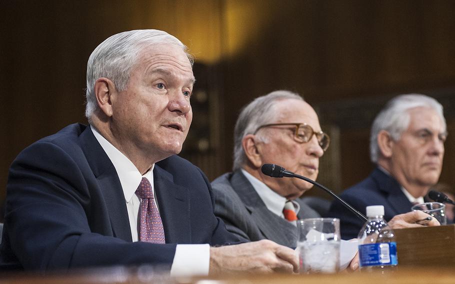 Former Defense Secretary Robert Gates gives his endorsement of Rex Tillerson, whom President-elect Donald Trump selected to become the next secretary of state, during a Senate Foreign Relations Committee hearing on Capitol Hill in Washington, D.C., on Wednesday, Jan. 11, 2017. Tillerson, at right, and former Senator Sam Nunn listen in the background.