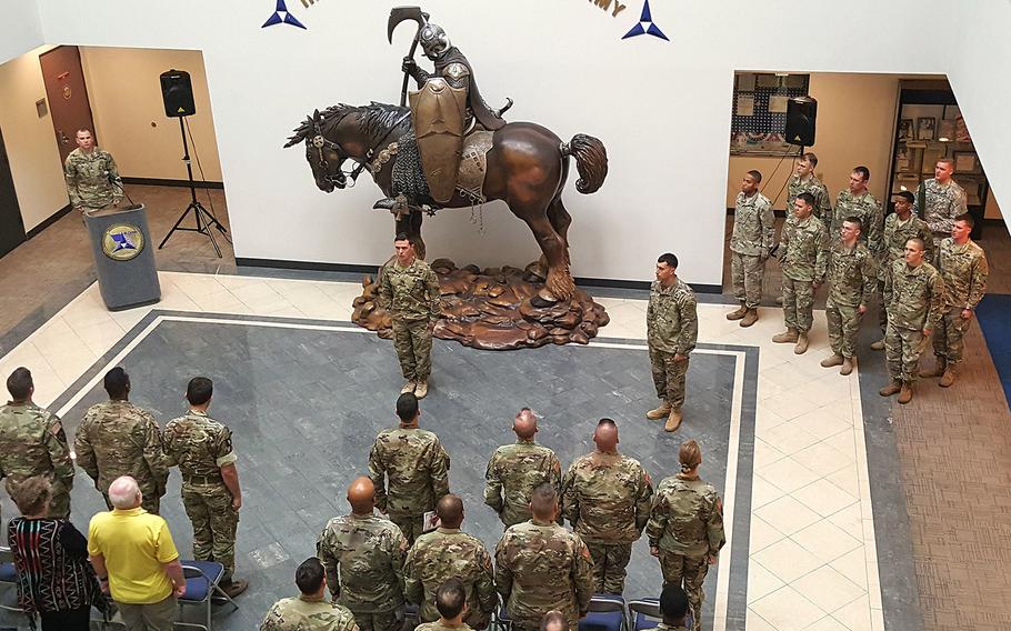 Soldiers with Delta Company, 52nd Infantry Regiment (Long Range Surveillance) conduct their unit's deactivation ceremony Jan. 10, 2017 inside the III Corp building at Fort Hood, Texas.