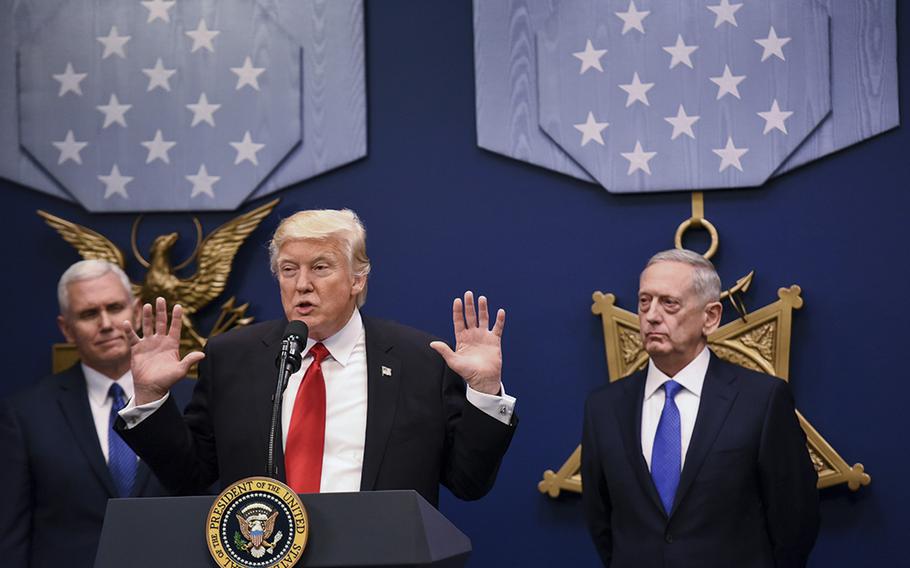 President Donald Trump speaks Friday as Vice President Mike Pence and Defense Secretary Jim Mattis look on during Trump's first visit to the Pentagon as commander in chief.