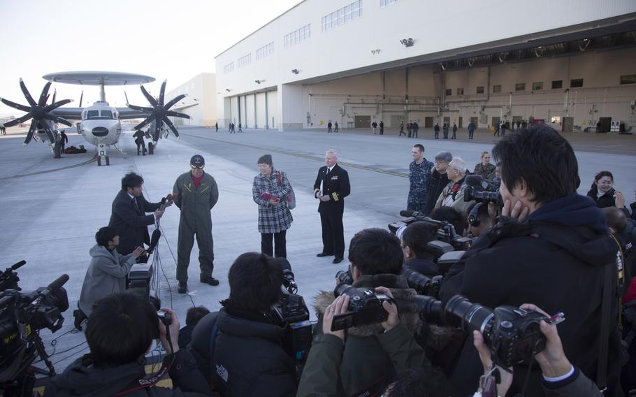 Cmdr. Daniel Prochazka, commanding officer of Carrier Airborne Early Warning Squadron 125, addresses the local media during a news conference upon arrival to Marine Corps Air Station Iwakuni, Japan, Wednesday, Feb. 2, 2017.