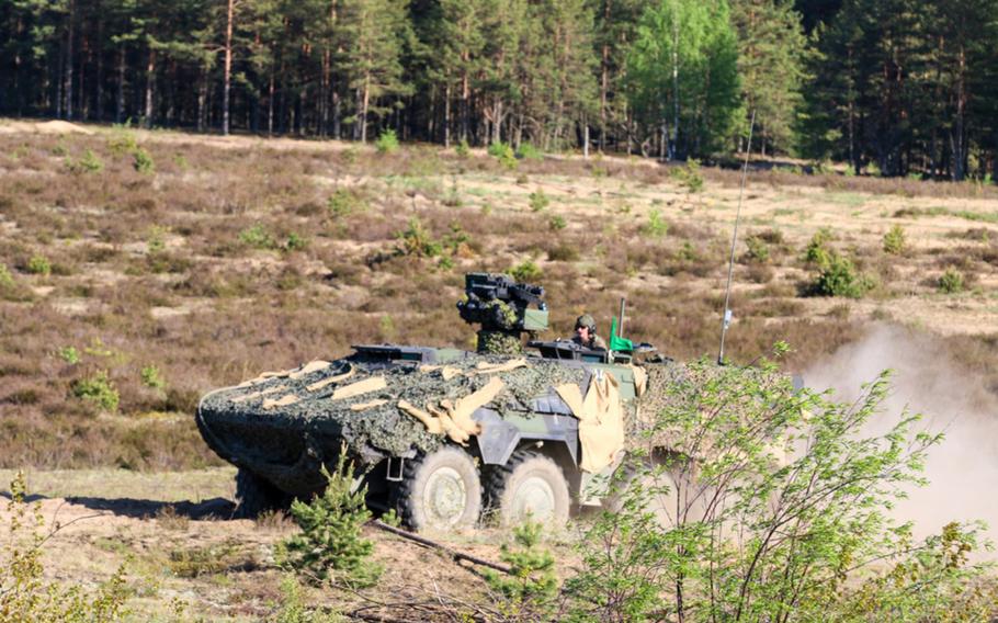 A German Army GTK Boxer Armoured Fighting Vehicle moves to its firing position during Exercise Hunter on May 12, 2016, in Pabrade, Lithuania, on May 12, 2016. German soldiers operating in Lithuania were targeted by a "fake news" attack this week.