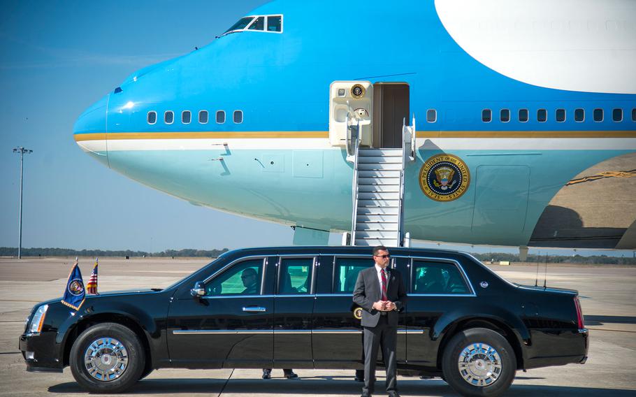 President Donald Trump’s motorcade pulls away from Air Force One on the flight line of MacDill Air Force Base, Fla., Feb. 6, 2017.