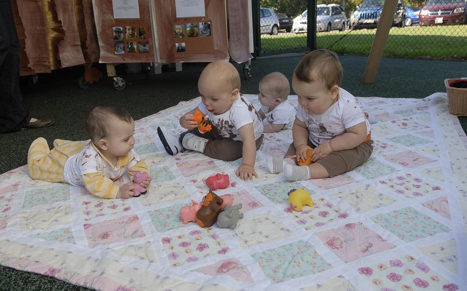 Babies spend time outdoors on a warm fall day at the Air Force's Vogelweh Child Development Center in Kaiserslautern, Germany. Officials say staffing shortages due to the federal hiring freeze may affect some families seeking on-base child care in the Kaiserslautern Military Community.