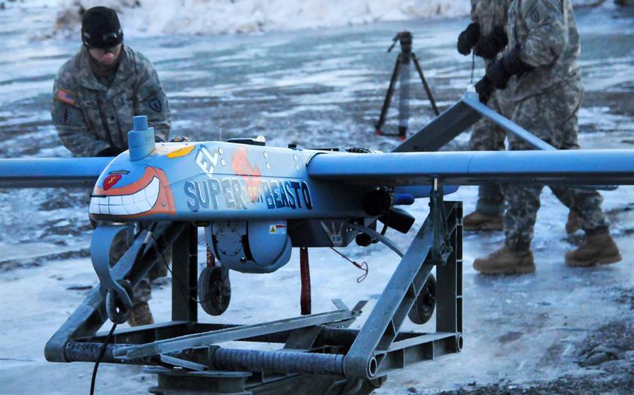 Paratroopers prepare an RQ7 Shadow unmanned aircraft system for launch on Forward Operating Base Sparta on Joint Base Elmendorf-Richardson, Alaska, Jan. 30, 2014. A Shadow RQ-7Bv2 unmanned aircraft went missing for 10 days after it was launched from southern Arizona on Jan. 31.