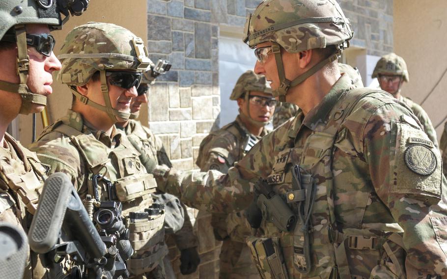 Lt. Gen. Stephen Townsend, right, meets with U.S. troops at tactical assembly area Hamam al-Alil, Iraq, on Feb. 22, 2017.