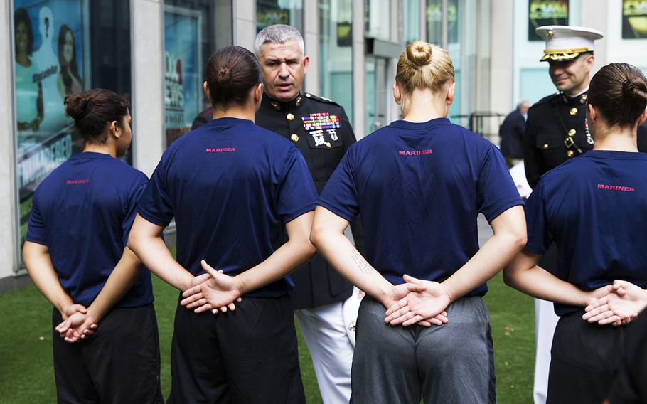 Female U.S. Marine Corps enlistees meet Maj. Gen. Paul Kennedy, commanding general of Marine Corps Recruiting Command, outside of the Fox News building in New York City, Aug. 17, 2016. 