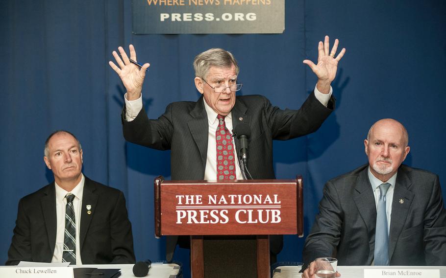 James Moriarty, Sr., holds up his hands during a National Press Club event in Washington, D.C., on Tuesday, March 7, 2017, as he demonstrated how his son, Staff Sgt. James Morarity called for help as a Jordanian military officer fired upon him and two other Green Berets who died in the Nov. 4, 2016, incident in Jordan.
