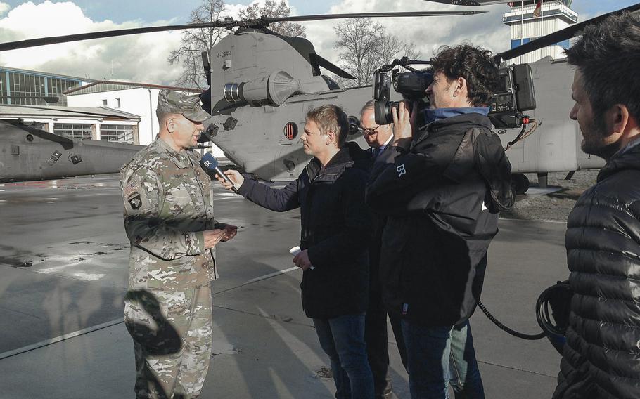 Lt. Gen. Ben Hodges, commander of U.S. Army Europe, speaks to a German reporters after a ceremony during which the10th Combat Aviation Brigade uncased its colors, symbolizing its arrival in Europe, at Storck Barracks in Illesheim, Germany, Thursday, March 9, 2017. The 10th CAB, of Fort Drum, N.Y., is the Army's first rotational aviation brigade in Europe.