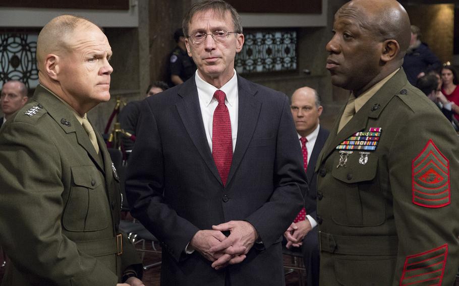 Marine Corps Commandant Gen. Robert B. Neller, Acting Secretary of the Navy Sean J. Stackley and Sergeant Major of the Marine Corps Ronald L. Green await the start of a Senate Armed Services Committee hearing on the Marines United social media controversy, March 14, 2017 on Capitol Hill.