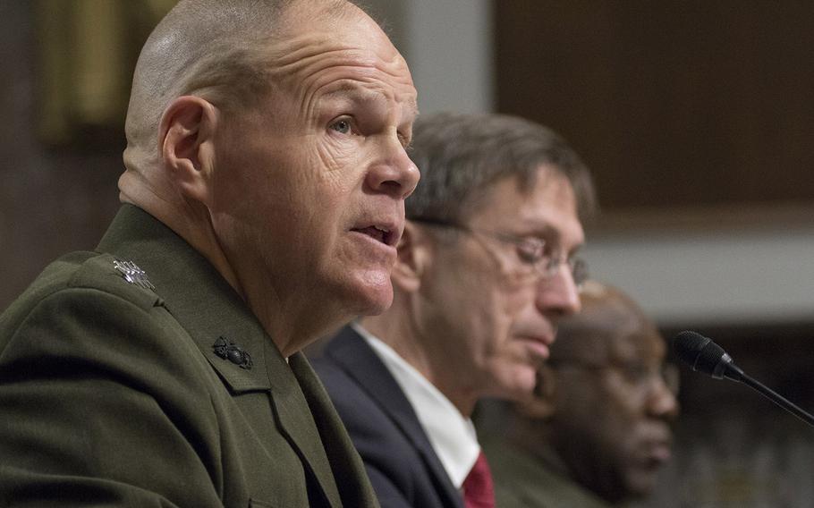 Marine Corps Commandant Gen. Robert B. Neller testifies during a Senate Armed Services Committee hearing on the Marines United social media controversy, March 14, 2017 on Capitol Hill. With him are Acting Secretary of the Navy Sean J. Stackley and Sergeant Major of the Marine Corps Ronald L. Green.