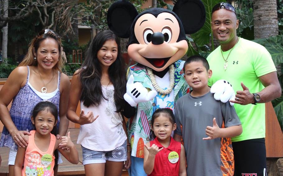 The Martinez family at the Aulani Disney Resort in Hawaii in 2012.