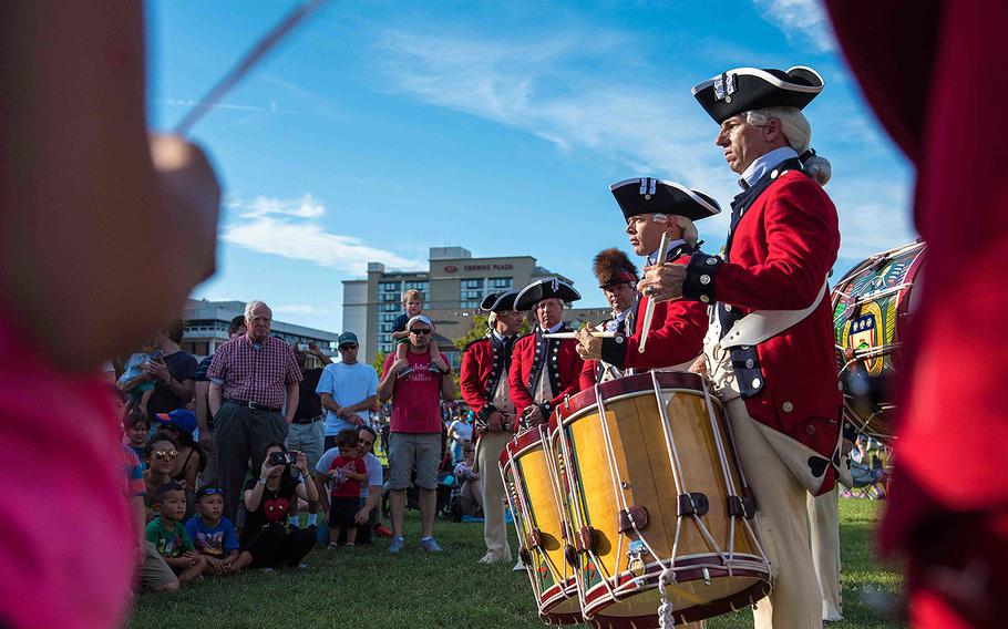 Soldiers with the U.S. Army Old Guard Fife and Drum Corps, assigned to the 3d U.S. Infantry Regiment (The Old Guard), participate in Alexandria City Birthday Celebration at Oronoco Bay Park, Alexandria, Va., July 8, 2017.