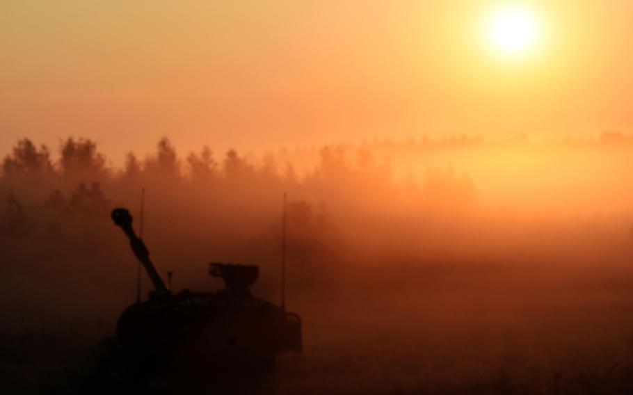 An M109 Paladin self-propelled howitzer at sunrise during Exercise Combined Resolve 9 at Grafenwoehr, Germany, on Aug. 23, 2017. 

