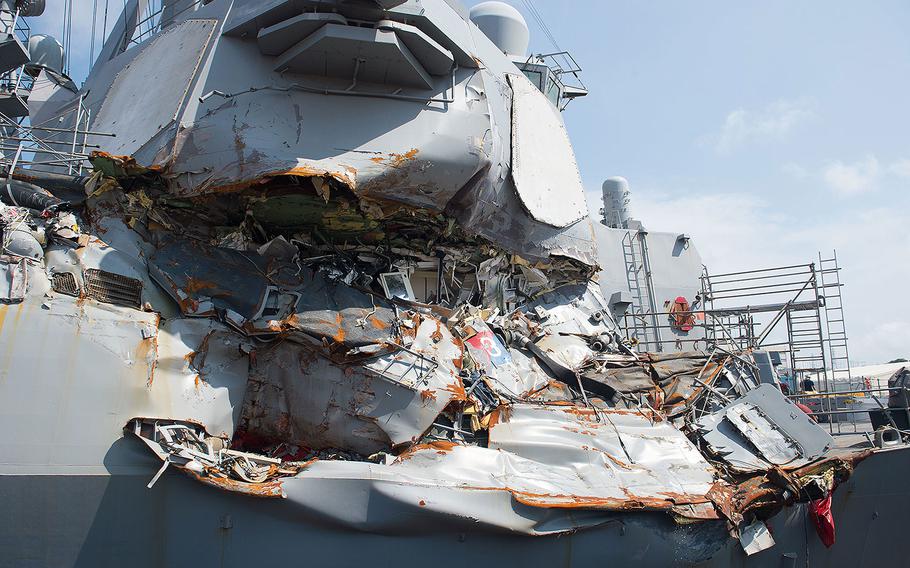 The USS Fitzgerald (DDG 62) sits in Dry Dock 4 at Fleet Activities Yokosuka to continue repairs and assess damage sustained from its June 17 collision with a merchant vessel.