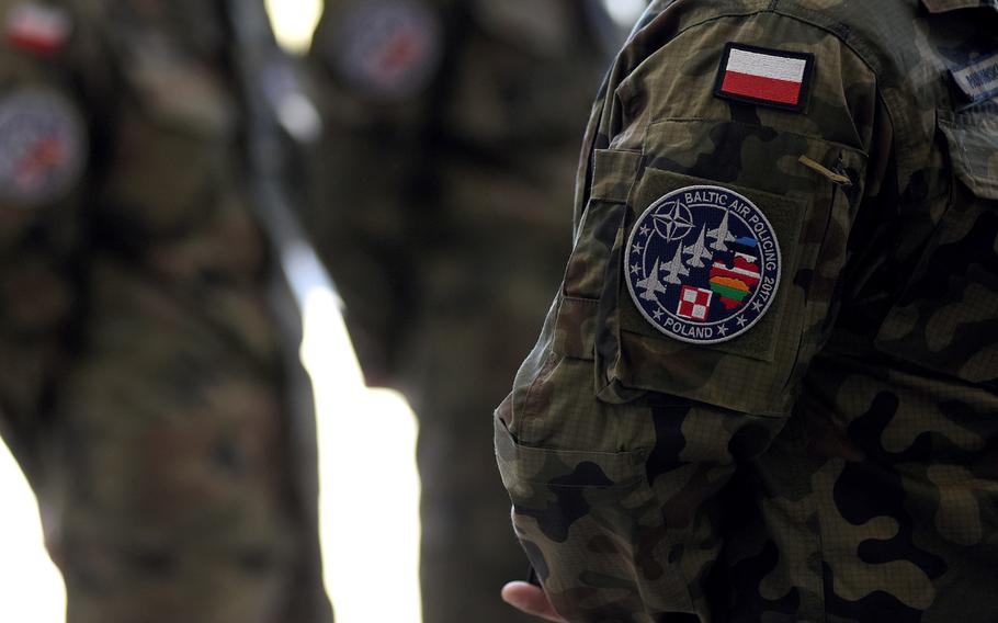 Members of the Polish air force earned a patch to war on their uniform, signifying their participation in the Baltic air policing mission this summer.

