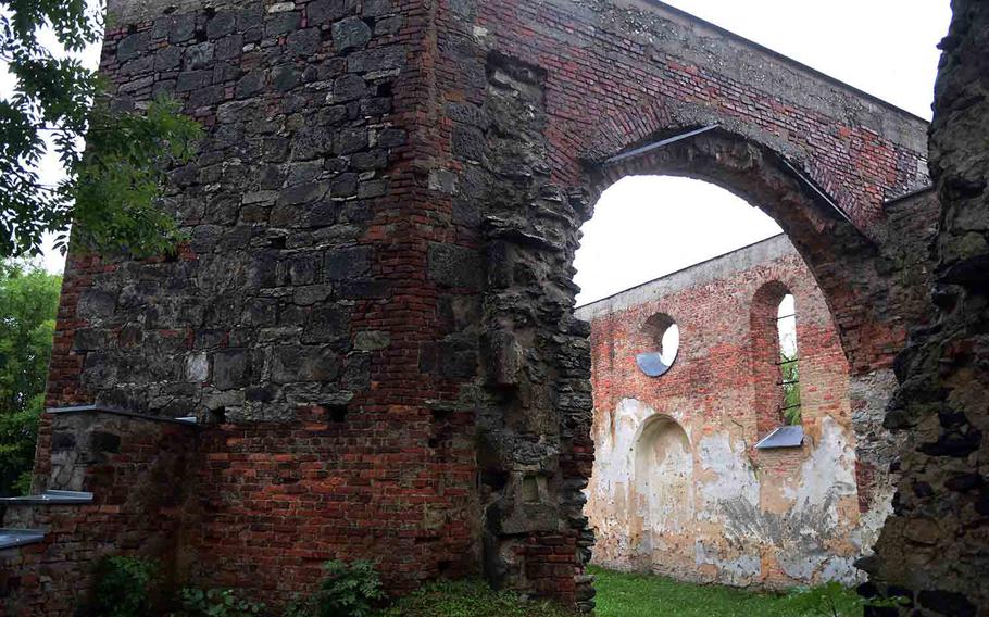 The ruined outer wall of Hopfenohe Church, at Grafenwoehr, Germany, Sept. 1, 2017. 