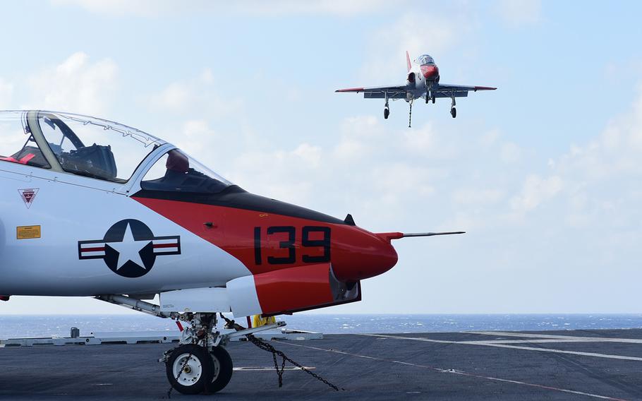 A T-45C Goshawk, assigned to Training Air Wing (TRAWING) 2, prepares land on the flight deck aboard USS Harry S. Truman on Sept. 17, 2017.