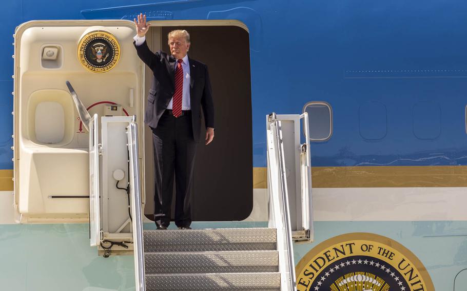 President Donald Trump waves goodbye at Marine Corps Air Station Yuma, Ariz., Aug. 22, 2017.
