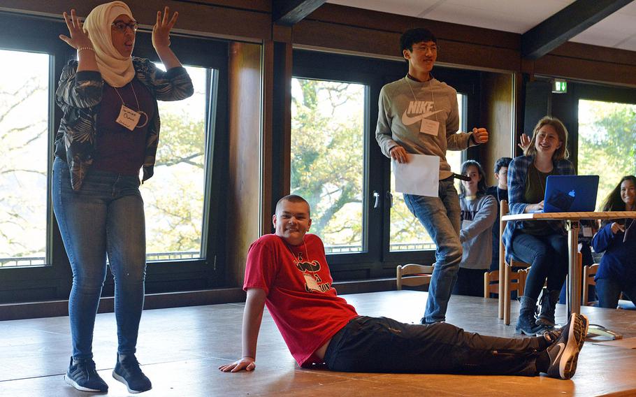 Bahrain's Jasmine Osman, Alconbury's Danny Vaughn and Ankara's Jiwoo Ha rehearse their parts in the drama workshop at DODEA-Europe's Creative Connections, Wednesday, Nov. 1, 2017.

