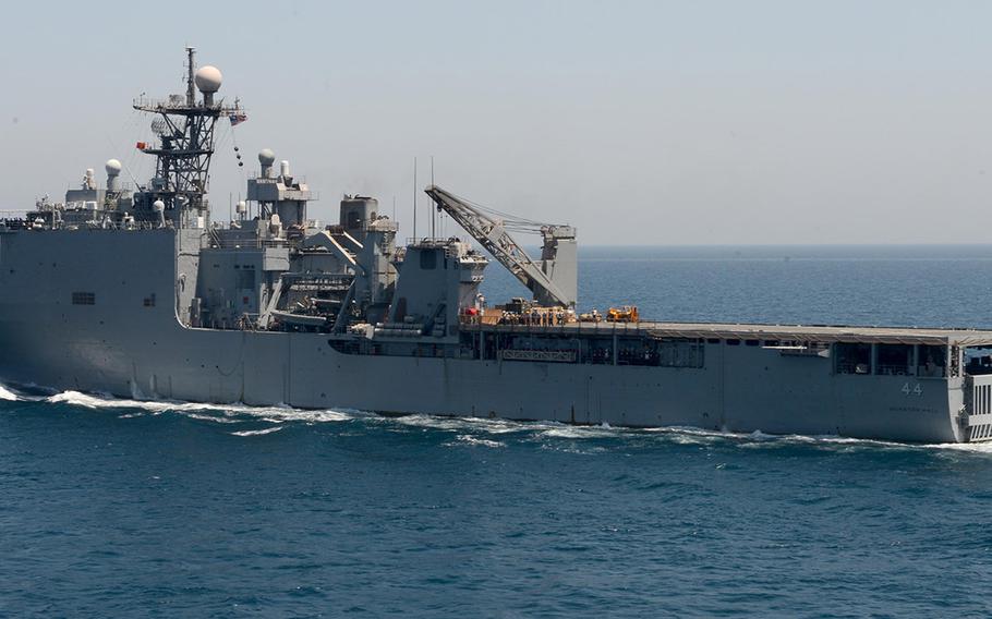 In a 2014 file photo, the amphibious dock landing ship USS Gunston Hall transits the Persian Gulf as part of the Bataan Amphibious Ready Group.
