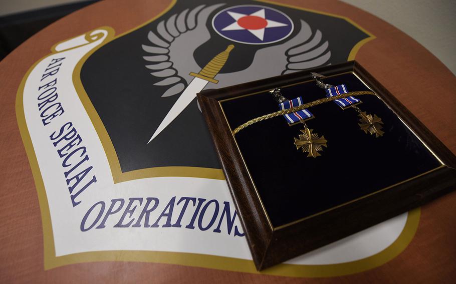 Capt. Charlotte Raabe and Staff Sgt. Gary Bjerke were each awarded the Distinguished Flying Cross on Jan. 5, 2018.