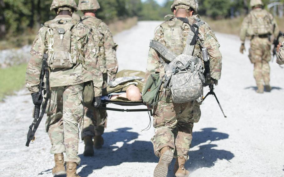 Soldiers with the 815th Brigade Engineer Battalion, 1st Security Force Assistance Brigade transport the injured during medical evacuation training at Fort Benning, Georgia, Oct. 24, 2017. They are the Army’s first brigade purposefully built to help combatant commanders accomplish theater security objectives by training, advising, assisting, accompanying and enabling allied and partnered indigenous security forces.