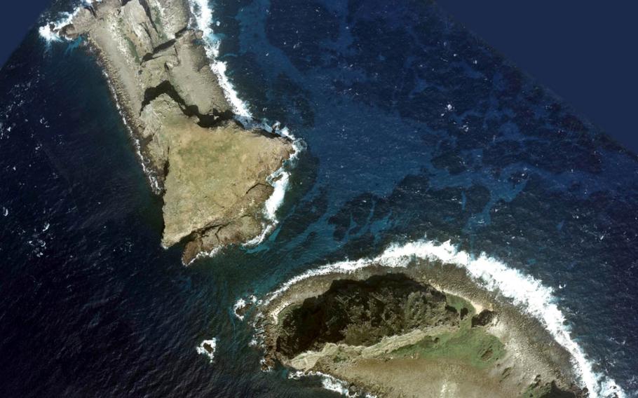 An aerial photo of two Senkaku islands, Kitakojima, top, and Minamikojima.