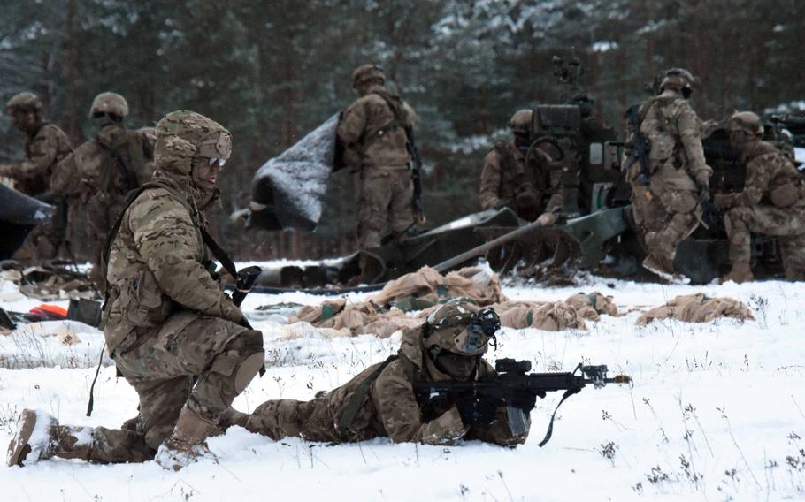 Soldiers with the 173rd Brigade Combat Team (Airborne) provide cover in the snow during an exercise at Grafenwoehr, Germany, on Wednesday, Jan. 17, 2018. 
