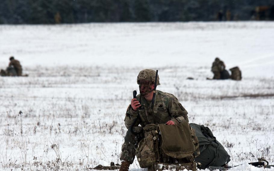 A soldier with the 173rd Brigade Combat Team (Airborne)radios in during an exercise at Grafenwoehr, Germany, Wednesday, Jan. 17, 2018. 
